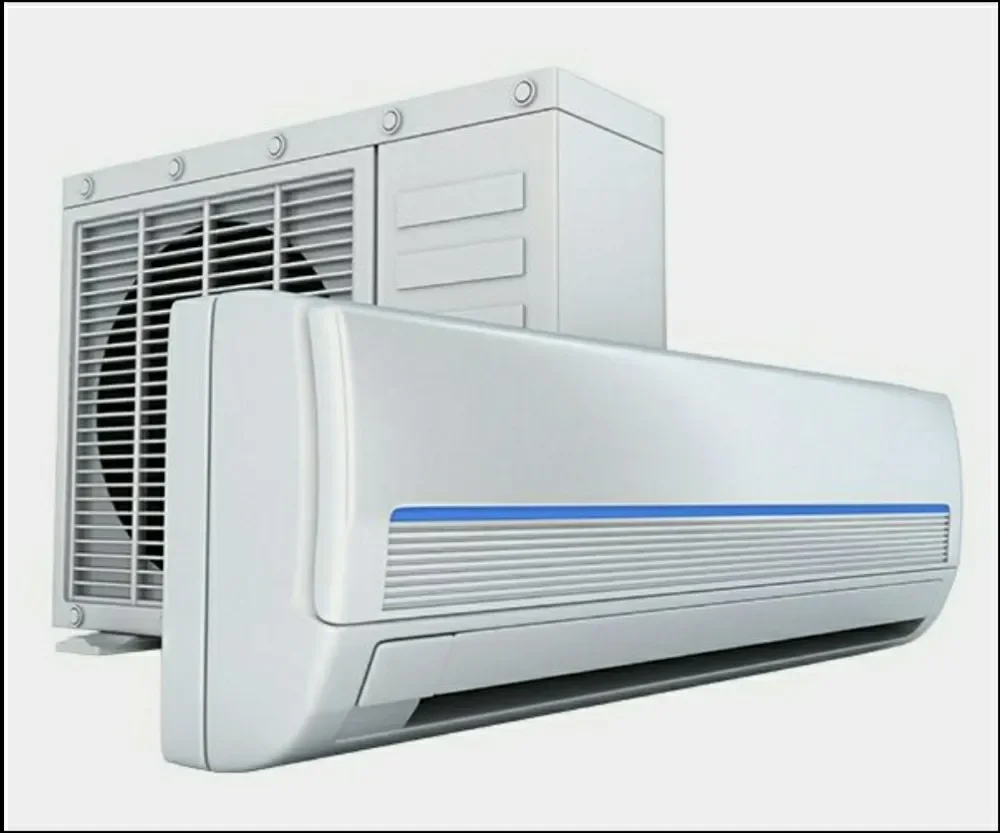 Technician servicing a split air conditioner unit